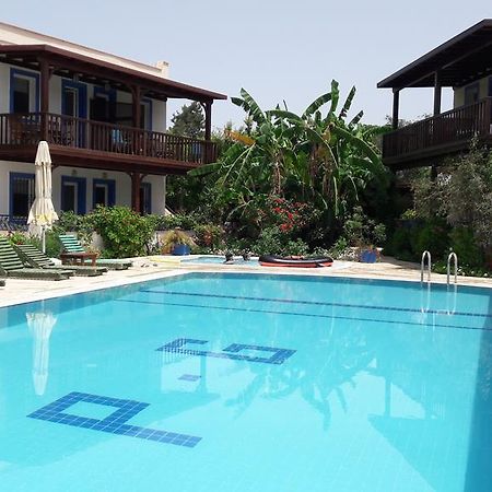 Paradise Garden Gumusluk Evleri Aparthotel Exteriör bild