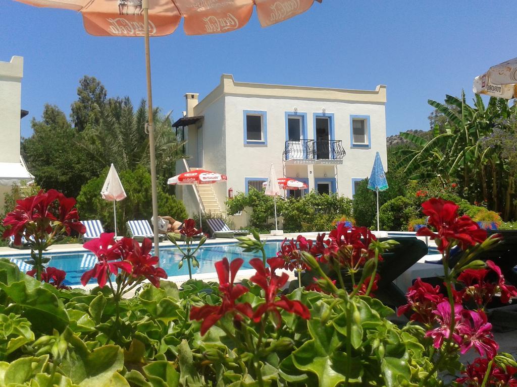 Paradise Garden Gumusluk Evleri Aparthotel Exteriör bild