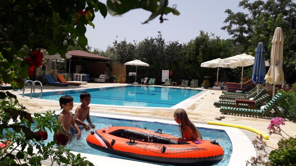 Paradise Garden Gumusluk Evleri Aparthotel Exteriör bild