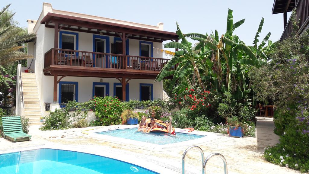 Paradise Garden Gumusluk Evleri Aparthotel Exteriör bild