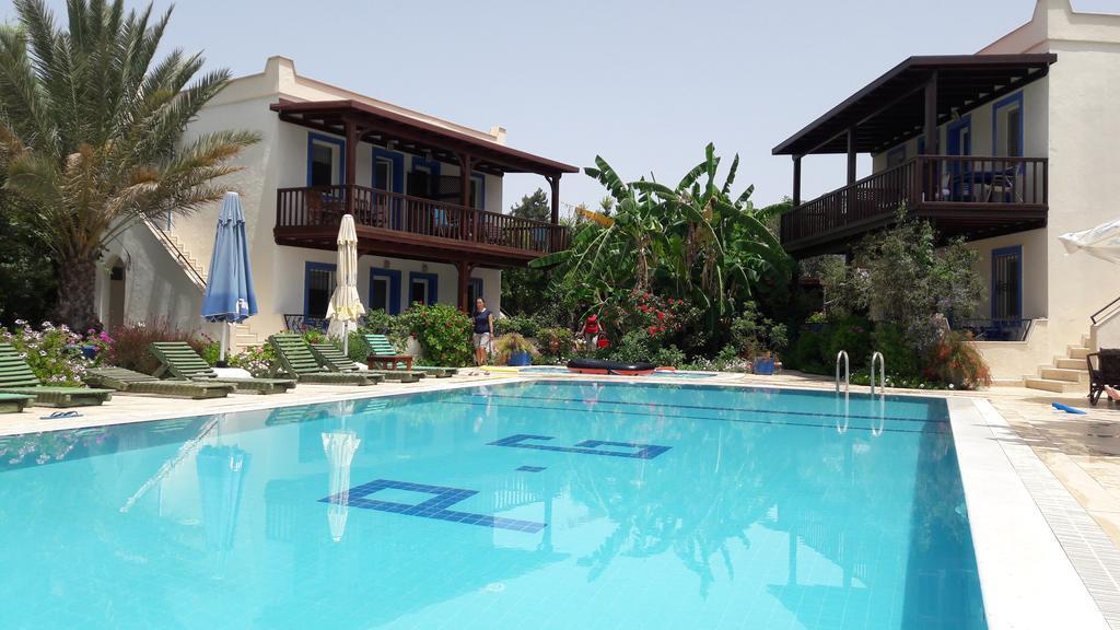 Paradise Garden Gumusluk Evleri Aparthotel Exteriör bild