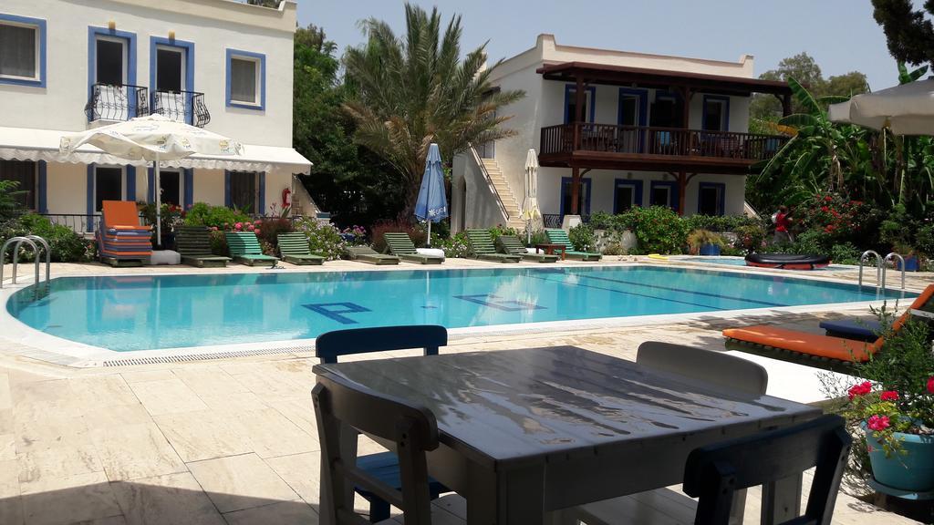 Paradise Garden Gumusluk Evleri Aparthotel Exteriör bild