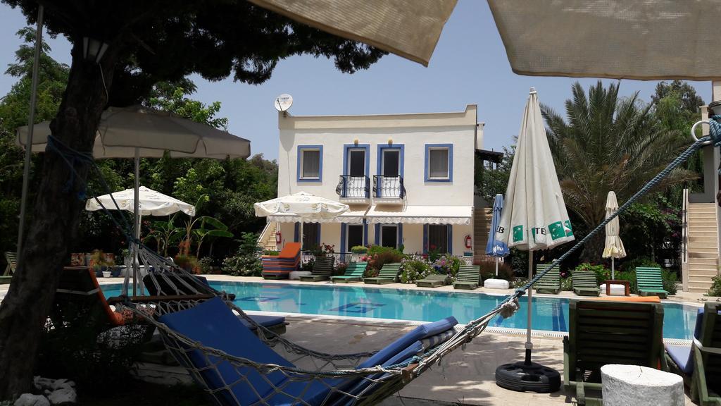 Paradise Garden Gumusluk Evleri Aparthotel Exteriör bild