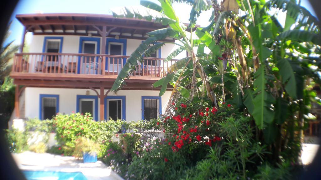 Paradise Garden Gumusluk Evleri Aparthotel Exteriör bild